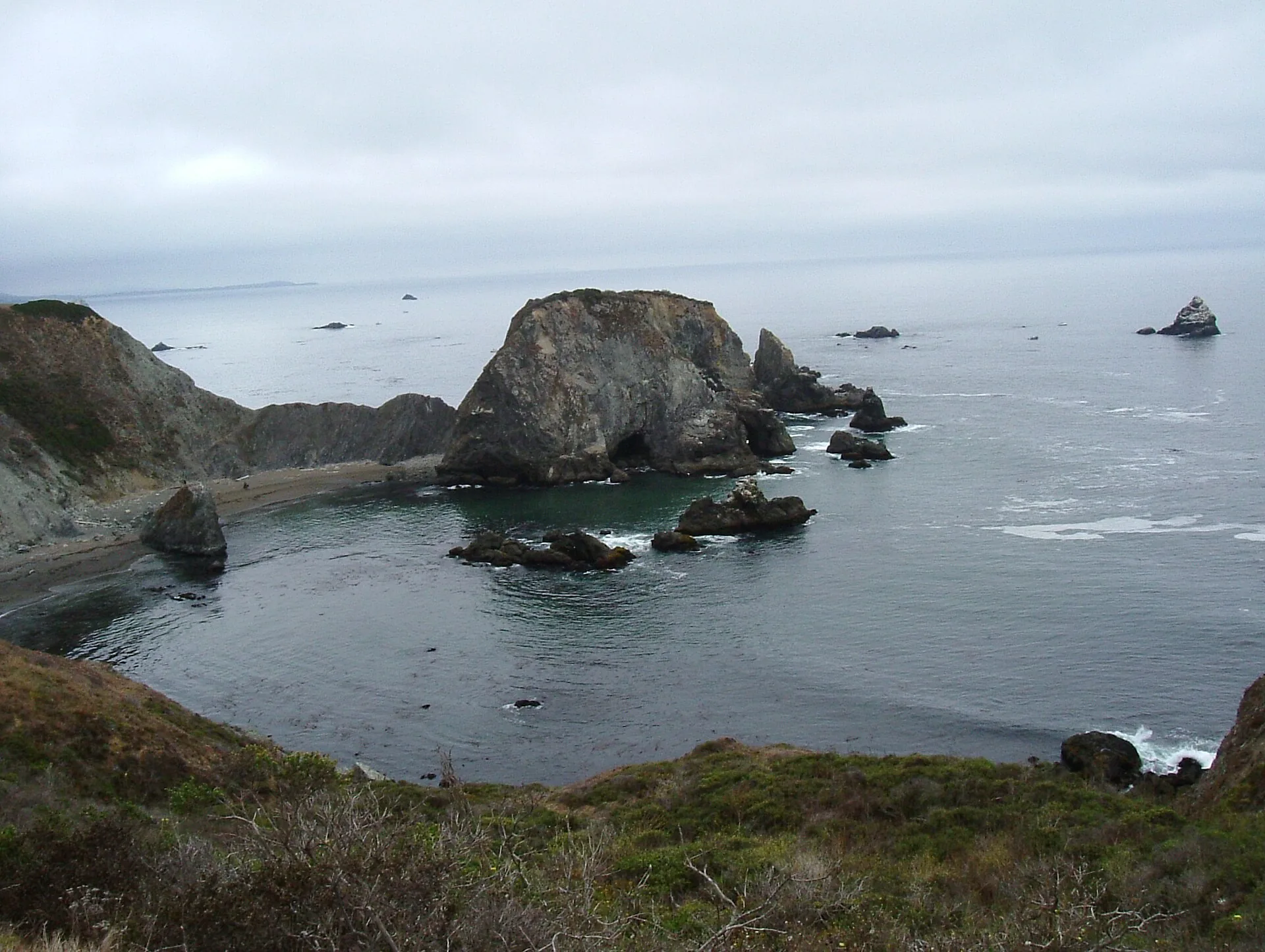 Dramatic Mendocino coastline bluffs meeting the Pacific